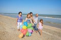 Happy family. Grandmother, grandfather, Mother, youngest daughter and an seventeen-year-old daughter with Down syndrome. Royalty Free Stock Photo