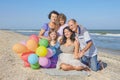 Happy family. Grandmother, grandfather, Mother, youngest daughter and an seventeen-year-old daughter with Down syndrome. Royalty Free Stock Photo