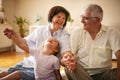 Happy family. Grandparents with granddaughter at home. Royalty Free Stock Photo