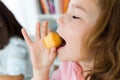 Happy family having breakfast at home. Royalty Free Stock Photo