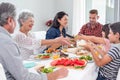 Happy family having breakfast Royalty Free Stock Photo