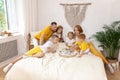 Happy family having breakfast together at home Royalty Free Stock Photo