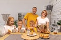 Happy family having breakfast together at home Royalty Free Stock Photo