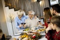 Happy family having dinner with red wine at home Royalty Free Stock Photo
