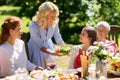 Happy family having dinner or summer garden party Royalty Free Stock Photo