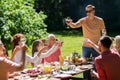 Happy family having dinner or summer garden party Royalty Free Stock Photo