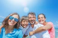 Happy family having fun at beach together. Fun happy lifestyle in the summer leisure Royalty Free Stock Photo