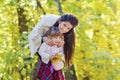 Happy Mother Having Fun with her Child in the Autumn Forest Royalty Free Stock Photo