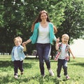 Happy family is having fun, mother and two children sons playing Royalty Free Stock Photo