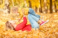 Happy family having fun outdoor in autumn park Royalty Free Stock Photo