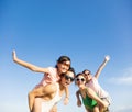 Happy family having fun outdoors against blue sky Royalty Free Stock Photo