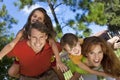 Happy Family Having Fun Outside In Park