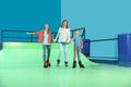 Happy family having fun at roller rink Royalty Free Stock Photo