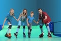 Happy family having fun at roller rink Royalty Free Stock Photo