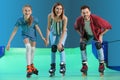 Family having fun at roller skating rink Royalty Free Stock Photo