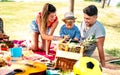 Happy family having fun together at picnic party - Joy and love life style concept with mother and father playing with child Royalty Free Stock Photo