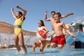 Family having fun at water park. Summer vacation Royalty Free Stock Photo