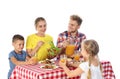 Happy family having picnic at table on  background Royalty Free Stock Photo