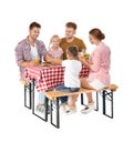Happy family having picnic at table on background Royalty Free Stock Photo