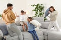 Happy family having pillow fight in room Royalty Free Stock Photo