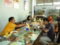 Happy family having roast chicken