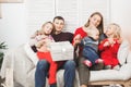 Happy family holding christmas gifts at home Royalty Free Stock Photo