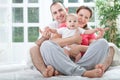 Happy family at home in bed Royalty Free Stock Photo