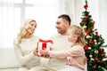 Happy family at home with christmas gift box Royalty Free Stock Photo