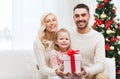 Happy family at home with christmas gift box Royalty Free Stock Photo