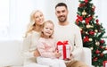 Happy family at home with christmas gift box Royalty Free Stock Photo