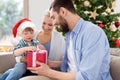 happy family at home with christmas gift box Royalty Free Stock Photo