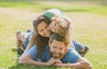 Happy family hugging and embracing on summer walk. Father mother and child walking in the Park and enjoying the Royalty Free Stock Photo