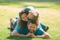 Happy family hugging and embracing on summer walk. Father mother and child walking in the Park and enjoying the Royalty Free Stock Photo