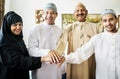 Happy family joining hands portraying teamwork and unity concept Royalty Free Stock Photo