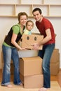 Happy family with a kid moving into a new home Royalty Free Stock Photo