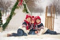 Happy family with kids, having fun outdoor in the snow on Christ Royalty Free Stock Photo