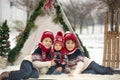 Happy family with kids, having fun outdoor in the snow on Christ Royalty Free Stock Photo