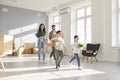 Happy family with kids moving to new home Royalty Free Stock Photo