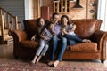 Happy family with kids use modern cellphone at home Royalty Free Stock Photo