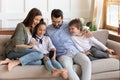 Happy family with kids watch video on cell at home Royalty Free Stock Photo