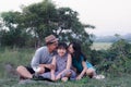 Happy family kissing daughter on the mountain.Concept of family and travel