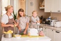 Happy Family in the Kitchen. Mother and Daughters Cooking. Cooking Activity, Cooking at Home , Domestic Food,Concept