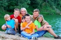 Happy family by the lake Royalty Free Stock Photo
