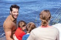 Happy family at a lake Royalty Free Stock Photo