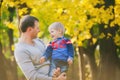 Happy family laughing and playing in autumn wood Royalty Free Stock Photo