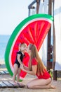 Happy family lifestyle. Relaxing and enjoying life. Bright colors. Top view Young mother with cute daughter Summer travel, water Royalty Free Stock Photo