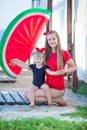 Happy family lifestyle. Relaxing and enjoying life. Bright colors. Top view Young mother with cute daughter Summer travel, water Royalty Free Stock Photo