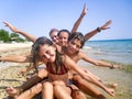 Happy Family with Little Kids Having Fun at the Beach. Royalty Free Stock Photo