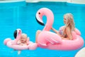 Happy family look summer vacations. Beautiful mother having fun with daughter.  Blonde pretty woman with her little girl wears in Royalty Free Stock Photo