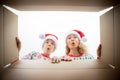 Surprised family unpack Christmas gift box Royalty Free Stock Photo